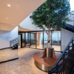 Prince-of-Wales-Drive-hallway-Impervia-herringbone-Champagne-Oak