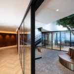 Prince-of-Wales-Drive-hallway-Impervia-herringbone-Champagne-Oak